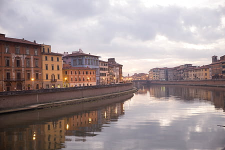A view of river Arno, Italy in the evening with clouds in the background thumbnail