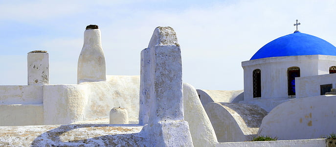 white and blue concrete building during daytime thumbnail