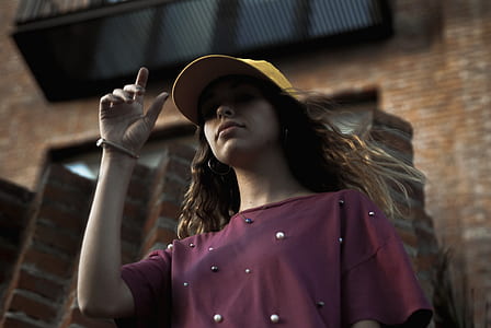 woman wearing yellow cap thumbnail
