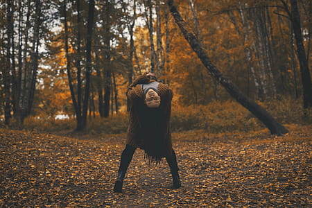 woman doing stunt at forest thumbnail