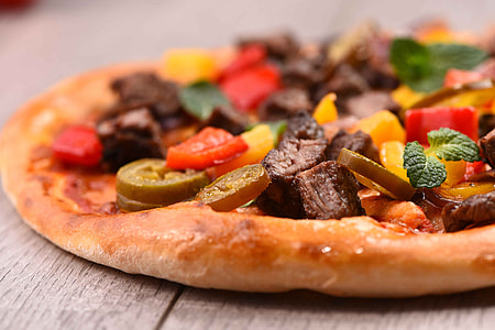 selective focus photo of pizza thumbnail