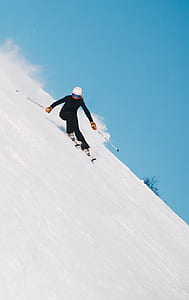 person doing ice skating during daytime thumbnail