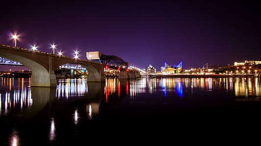 bridge surrounded by body of water thumbnail