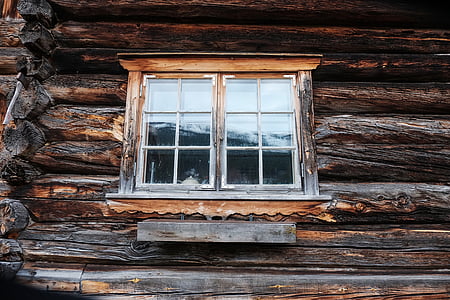brown wooden framed window taken at daytime thumbnail