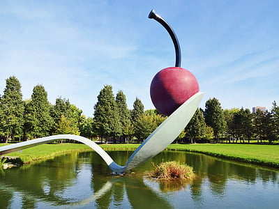 cherry on spoon statue on lake thumbnail