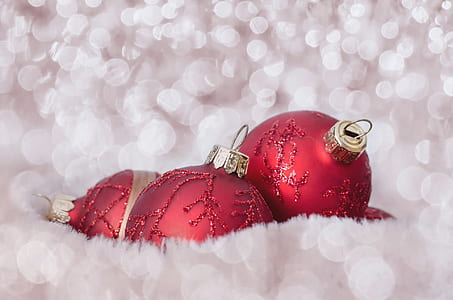 three baubles on white surface thumbnail