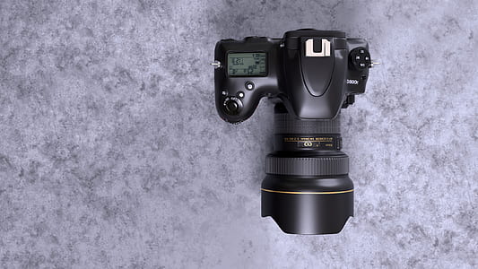 black DSLR camera thumbnail