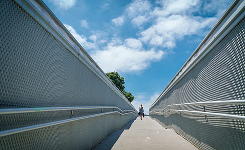 person walking on pathway thumbnail