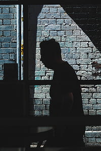 shadow of man on wall thumbnail