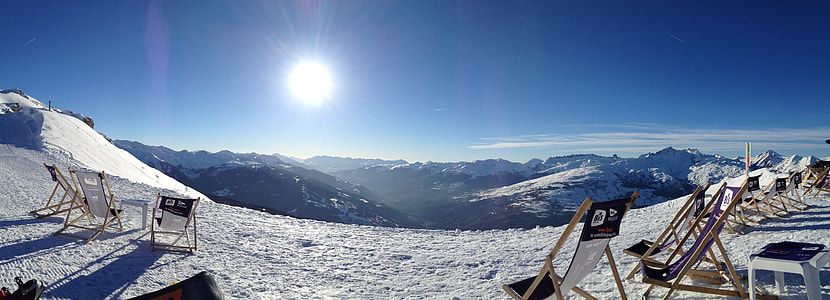 chairs on snowy mountain thumbnail