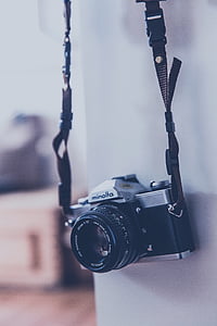 closeup photo of gray and black Minolta DSLR camera thumbnail