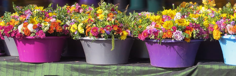 flower arrangements on green table thumbnail