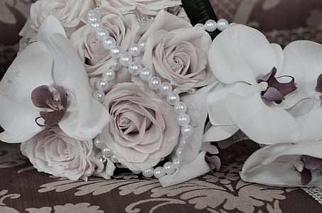 white flower bouquet on gray textile thumbnail