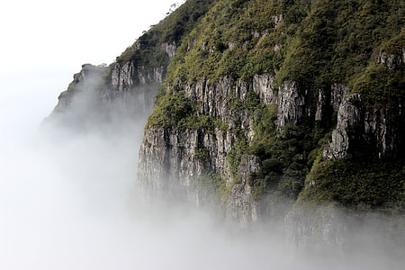 grass mountain with fogs during daytime thumbnail