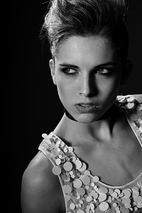 greyscale photo of woman wearing sleeveless top thumbnail