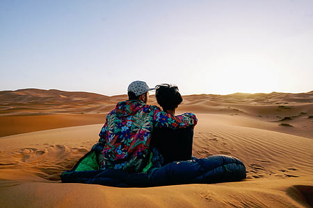 man beside woman at desert thumbnail