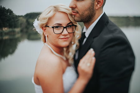 woman in white sleeveless dress thumbnail