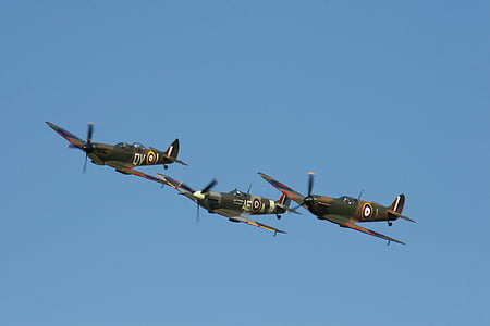 three brown-and-gray planes thumbnail