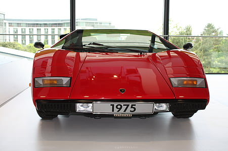 classic red Lamborghini Countach coupe inside building thumbnail