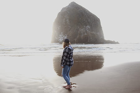 woman standing on beach thumbnail