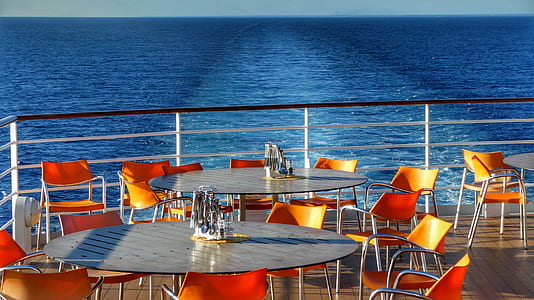 table and chairs on terrace thumbnail