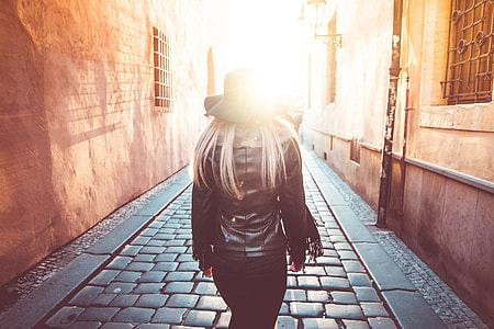 Young Woman Walking Alone in Prague Streets thumbnail