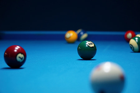 selective focus photo of multicolored billiard balls thumbnail