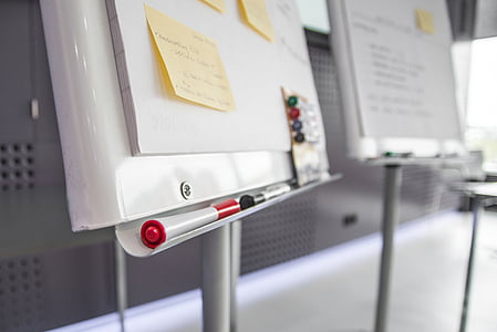 red and white permanent marker on white metal hanging board thumbnail