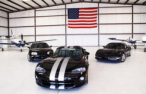 three black cars parked thumbnail