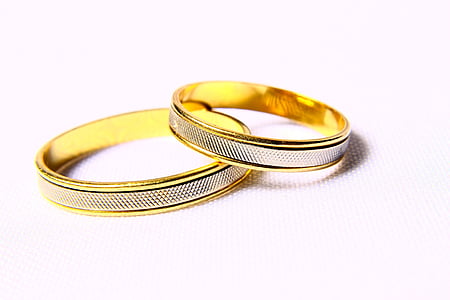 two round gold-colored coins thumbnail