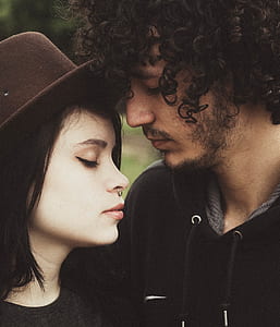 man and woman facing each other thumbnail