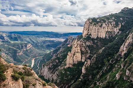 landscape photography of green and gray rocky mountains thumbnail