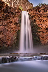 waterfalls during daytime thumbnail