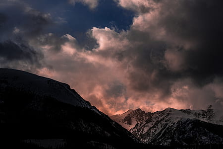 silhouette of mountain during golden hour thumbnail