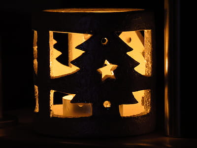 lighted candle on candle holder thumbnail