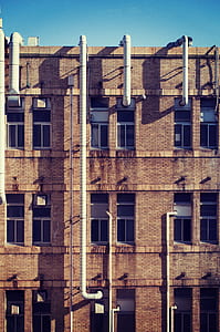 brown concrete brick building thumbnail