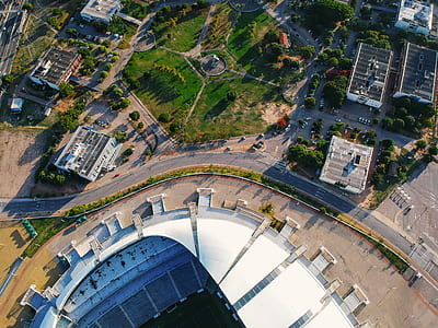 aerial photography of concrete buildings and road at daytime thumbnail