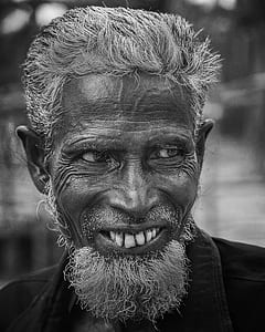 grayscale photo of smiling man thumbnail