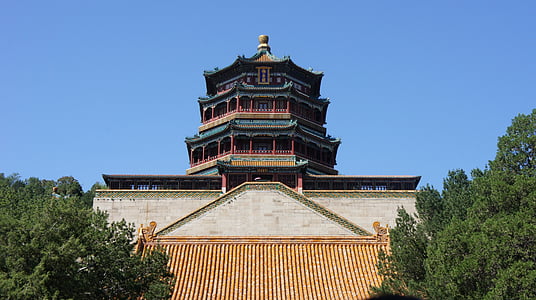 low angle photography of brown and red pagoda at daytime thumbnail