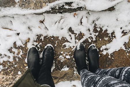 two person standing on snow thumbnail