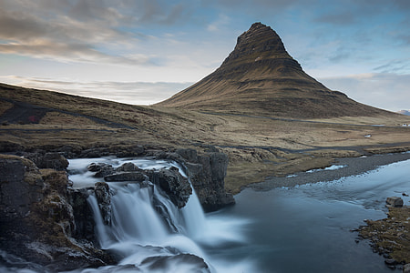 Stunning mountains and waterfall in Iceland thumbnail