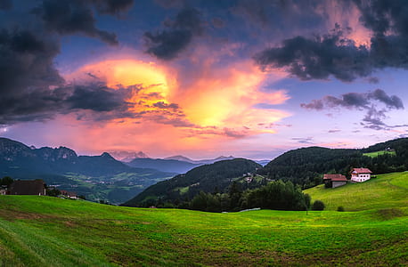 Scenic View of Landscape Against Cloudy Sky thumbnail