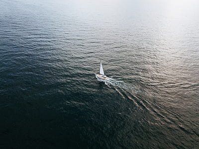 birds eye view of bowrider on body of water thumbnail