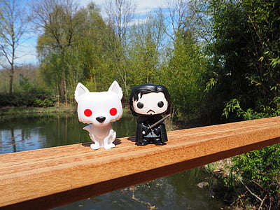 Jon Snow figurine near body of water thumbnail