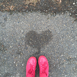 photo of persons wearing pink low-top sneakers thumbnail