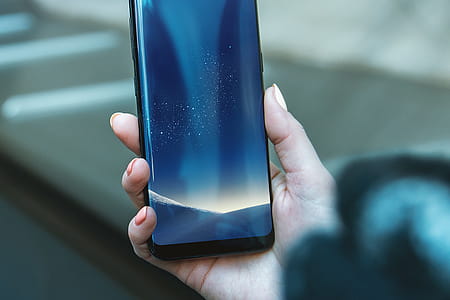 Woman with a smartphone. Hi-Res Photo Realistic Galaxy S8 PSD Mockup. thumbnail