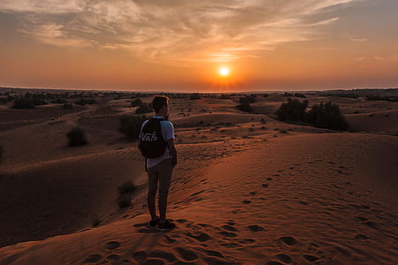 man standing on desert thumbnail