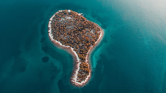 aerial photo of island during daytime thumbnail