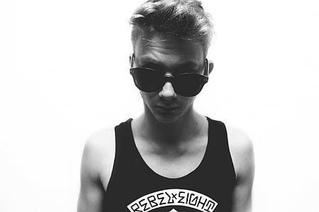 man wearing sunglasses and sleeveless shirt thumbnail