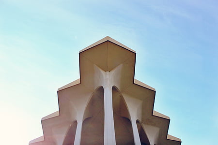 beige architecture under blue sky thumbnail
